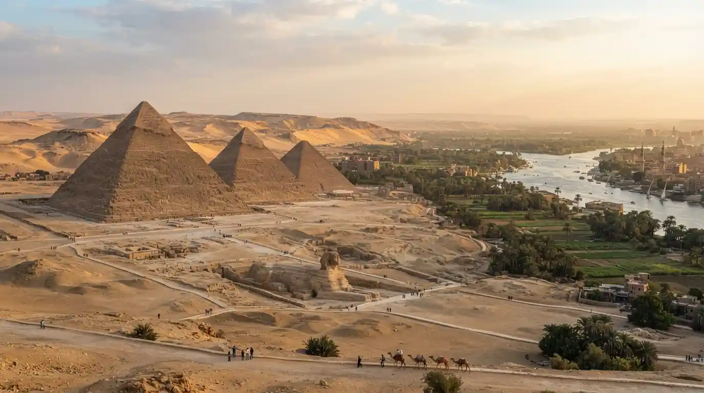 Great Pyramids of Giza with the Egyptian desert and Nile landscape at golden hour